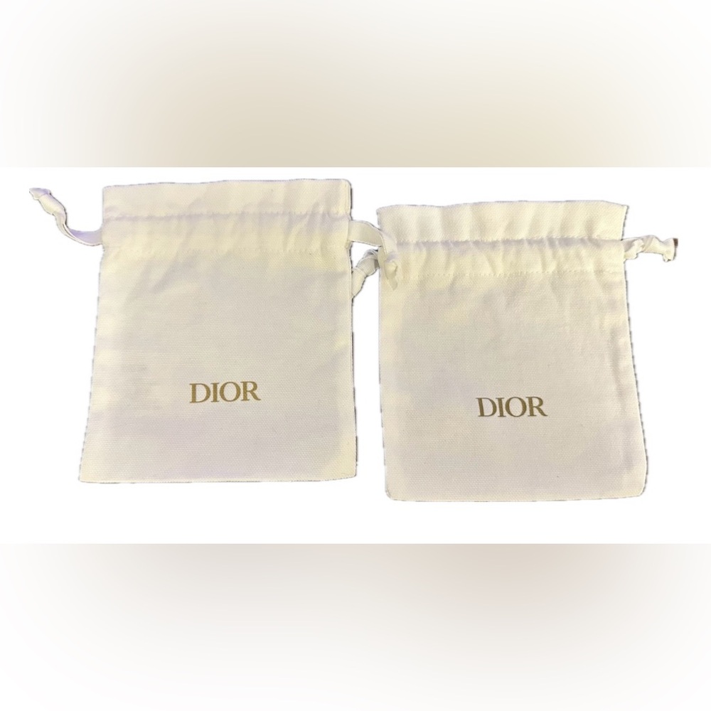Dior Ivory Drawstring Bags
